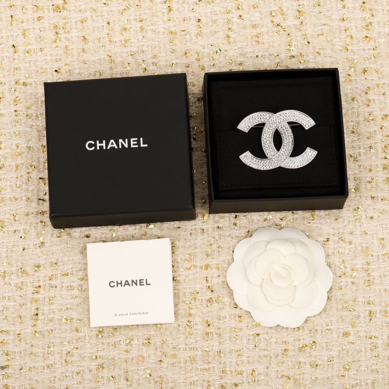Ch**el brooches